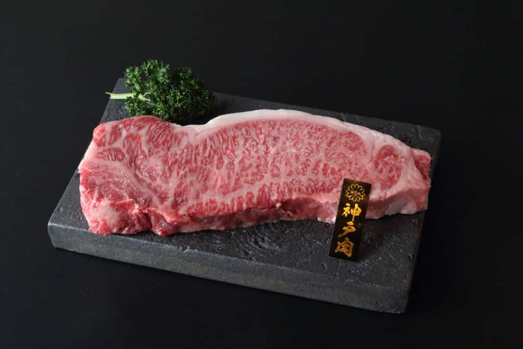 a piece of meat on a black surface